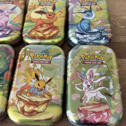 Pokemon Prismatic Evolution Mini Tin Set With ART and COINS. *EMPTY* - Image 3