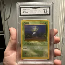 1999 POKEMON JUNGLE ODDISH 58/64 (MP) COMMON GMA 8.5 - Image 1