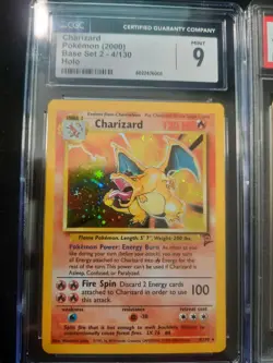 CGC 9 MINT Charizard 2000 Base Set 2 4/130 Holo Pokemon Card - Image 1