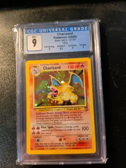 CGC 9 MINT Charizard 2000 Base Set 2 4/130 Holo Pokemon Card - Image 1