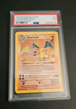 1999 POKEMON BASE SET SHADOWLESS #4 CHARIZARD-HOLO PSA 7 - Image 1