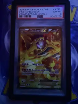 Charizard EX XY121 Red & Blue Collection Promo Card PSA 8 with Card Guard - Image 1