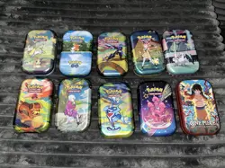 7 Pokemon Tin Lot With One Piece Tin (no Cards) - Image 1