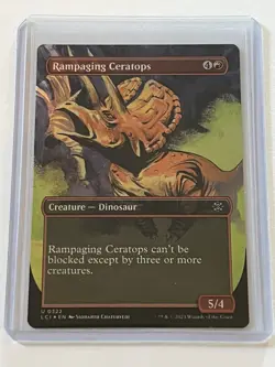 Rampaging Ceratops 322 MTG Lost Caverns Ixalan 2023 MT - 9.0 + Borderless Foil - Image 1