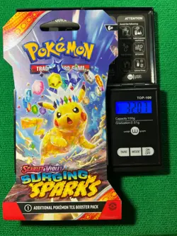 HEAVYU 32.07 Grams! Pokemon Surging Sparks Factory Sealed Booster Pack!! - Image 1
