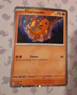 Charmander - 047 (Cosmos Holo) 047 Sv: Scarlet & Violet Promo Cards Holo - Image 1