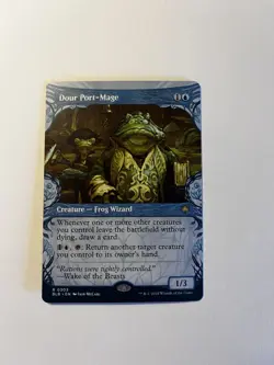 Dour Port-Mage (Showcase) Bloomburrow Regular - Image 1