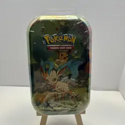 Prismatic Evolutions Mini Tin Collectible Card and Coin Leafeon - Image 1