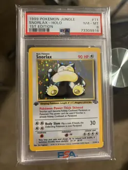 1999 Pokemon Snorlax 1st Edition Holo 11/64 Jungle PSA 8 - Image 1