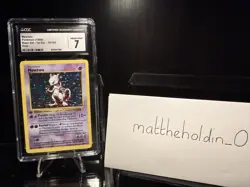 1999 Pokemon Base Set 1st Edition Shadowless Holo Mewtwo CGC 7 #10/102 - Image 1