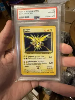 1999 Pokemon Base Set Unlimited #16 Zapdos Holo PSA 8 - Image 1