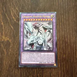 DRAGON MASTER MAGIA - 1ST EDITION PRISMATIC ULTIMATE RARE RA04-EN055 YUGIOH - Image 1