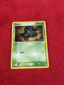 Pineco 66/115 Unseen Forces Reverse Holo Pokemon Card Played - Image 1