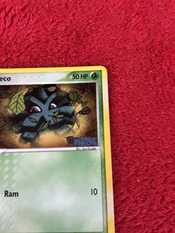 Pineco 66/115 Unseen Forces Reverse Holo Pokemon Card Played - Image 2