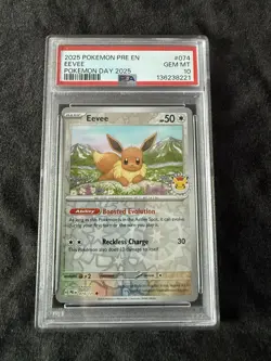 2025 POKEMON PRE EN-PRISMATIC EVOLUTIONS POKEMON DAY 2025 #074 EEVEE PSA 10 - Image 1