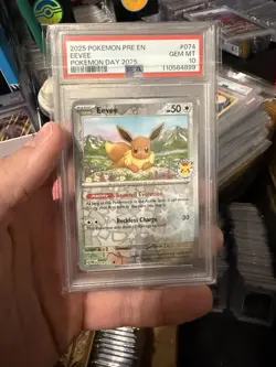 2025 POKEMON PRE EN-PRISMATIC EVOLUTIONS POKEMON DAY 2025 #074 EEVEE PSA 10 - Image 1