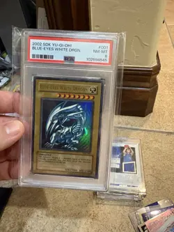 Blue-Eyes White Dragon SDK-001 Starter Deck Kaiba PSA 8 Graded - Image 1