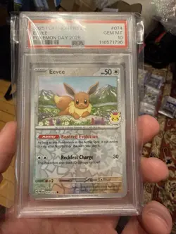 2025 Pokemon Pre EN Prismatic Evolutions Eevee #074 Pokemon Day 2025 PSA 10 - Image 1