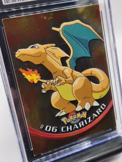 Charizard - Pokemon Topps Series 1-6 First Print Silver Foil, Near Mint (CGC 7) - Image 2