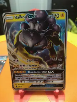 Pokemon Sun & Moon Raikou GX SM121 Holo Black Star Promo LP - Image 1