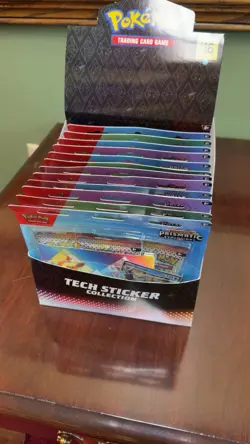 Pokemon Prismatic Evolutions Tech Sticker Collection Lot of 12 plus Display - Image 1