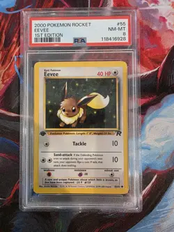 Eevee 55/82 - Team Rocket - 1st Edition - Pokemon TCG - PSA 8 - Image 1