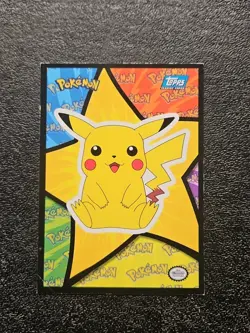 1999 Topps Sticker Pokemon Pikachu sitting puzzle piece blue logo vintage tcg - Image 1