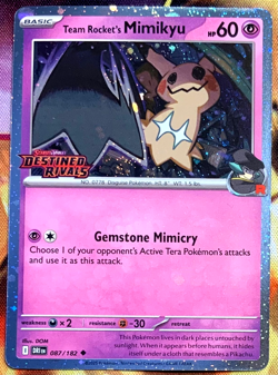 Pokemon Destined Rivals Team Rocket Mimikyu Stamped Promo 87 /182 - Image 1