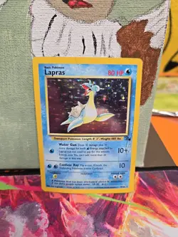 Pokemon TCG Lapras Fossil 10 Holo Unlimited Rare DMG Condition - Image 1