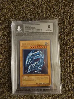 Yu-Gi-Oh 2002 Blue-Eyes White Dragon SDK-001 Ultra Rare BGS 8 - Image 1