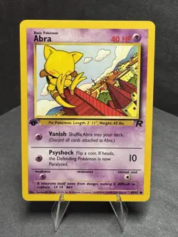Pokemon TCG 1st Edition Abra 49/82 Team Rocket Common Card - Image 1