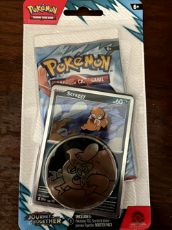 1x Pokemon TCG Journey Together Scraggy Checklane Blister Sealed - Image 1