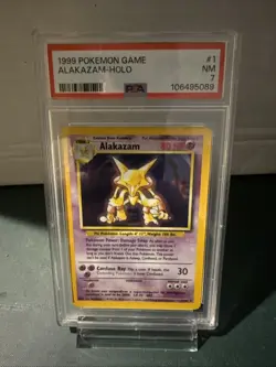 1999 Pokemon TCG Alakazam Base Set Holo Unlimited Rare Card 1/102 PSA 7 - Image 1