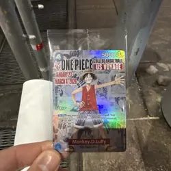 One Piece Monkey.D.Luffy US College Basketball Promo Card In-Hand - Image 1