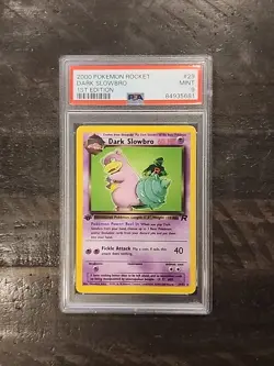 2000 Pokemon Team Rocket 1st Edition #29 Dark Slowbro PSA 9 - Image 1
