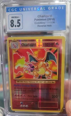CHARIZARD 2016 POKEMON EVOLUTIONS REVERSE HOLO RARE 11/108 CGC 8.5 - Image 1