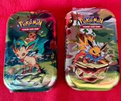 (2) 2025 Pokemon TCG Prismatic Evolution Scarlet & Violet Mini Tins - Image 1