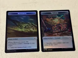 2 x mtg foil token Meteorite // Treasure, 0017/0018, Outlaws of Thunder Junction - Image 1