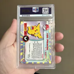 1999 Topps Pokemon TV #25 Pikachu Rainbow Foil Blue Logo PSA 7 - Image 2