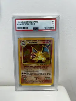 1999 POKEMON BASE SET UNLIMITED #4 CHARIZARD-HOLO PSA 1 - Image 1