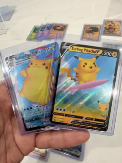 MINT Pokemon Surfing Pikachu # 008/025 & 009/025 - Celebrations 25th. Holo Rares - Image 1
