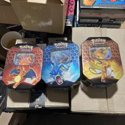 Pokemon TCG Hidden Fates Tins Charizard Gyarados Raichu ART Set of 3 Brand New - Image 1