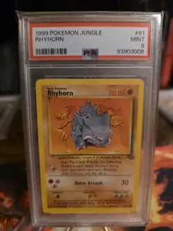 RHYHORN 61/64 - JUNGLE 1999 POKEMON CARD - FRESH SLAB - PSA 9 MINT - Image 1