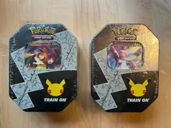 (2) Pokemon Celebrations 25th Anniversary Tins Lance's Charizard & Dark Sylveon - Image 1