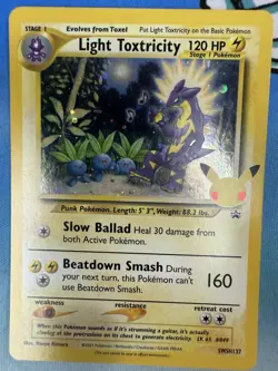 Light Toxtricity SWSH137 Celebrations Black Star Promo Pokemon Card - Image 1