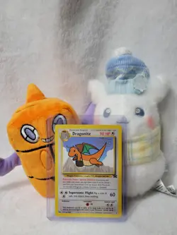 NM 1999 Dragonite WB The First Movie Stamp Black Star Promo 5 Pokemon Card - Image 1