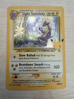 Pokemon TCG Light Toxtricity SWSH137 Celebrations 25th Black Star Promo Holo - Image 1
