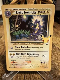 Pokemon TCG Celebrations Light Toxtricity SWSH137 Black Star Promo Holo NM - Image 1