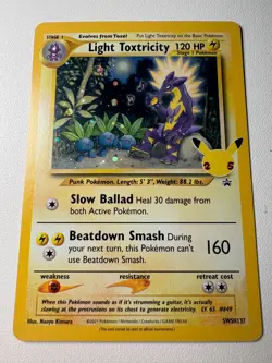 Pokemon TCG Light Toxtricity SWSH137 Celebrations 25th Black Star Promo Holo NM - Image 1