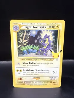 Pokemon TCG Light Toxtricity SWSH137 Celebrations Black Star Promo - Image 1